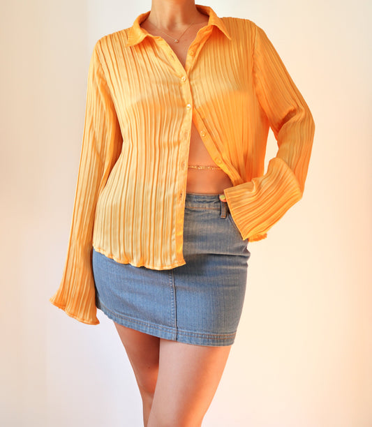 Yellow pleated shirt